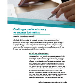 Publication cover showing  a hand holding a pen