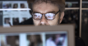 Man staring at a computer screen