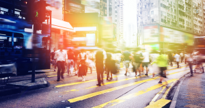 a multicultured abtract photo of an urban street with pedestrians