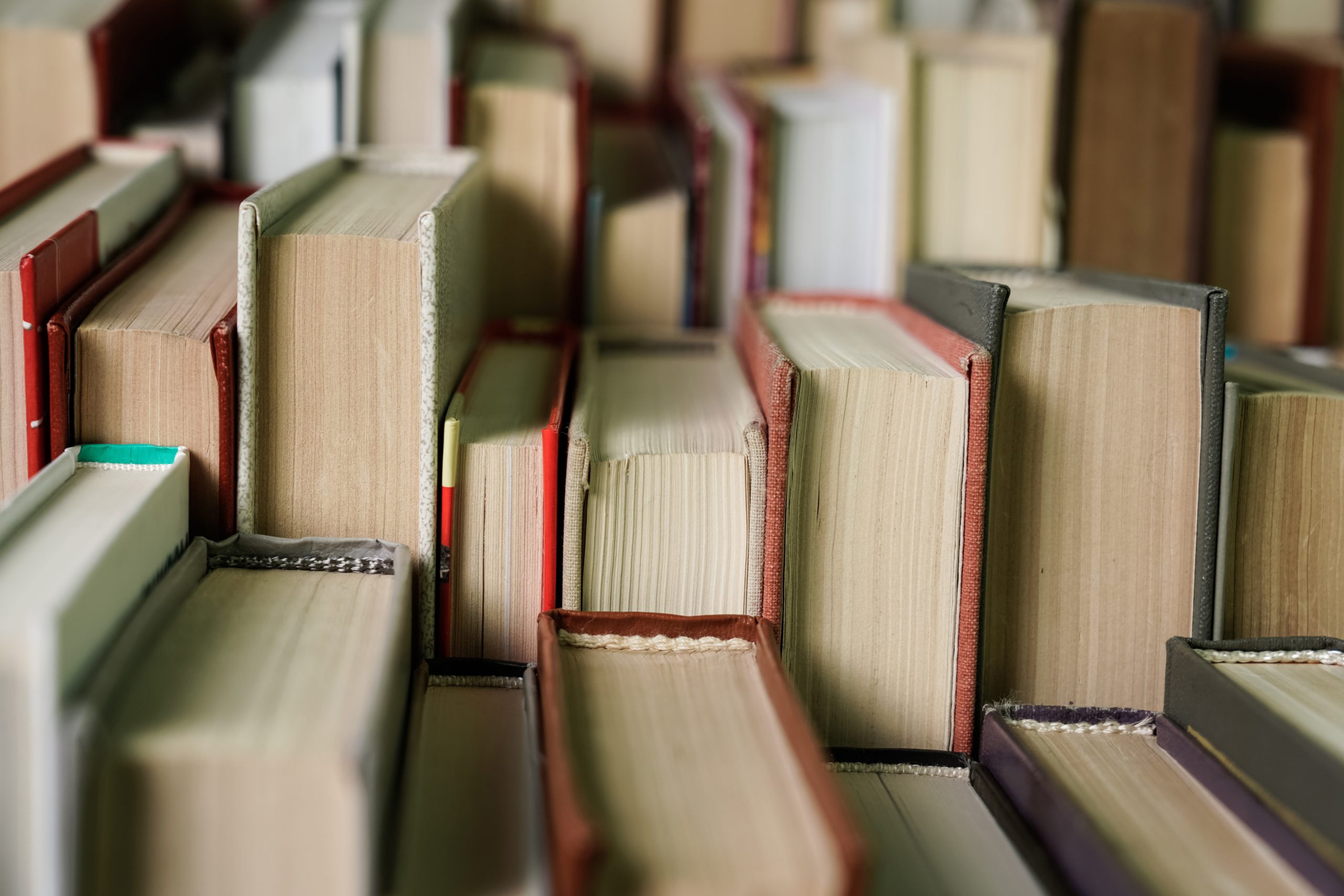 a stack of books shown from the side