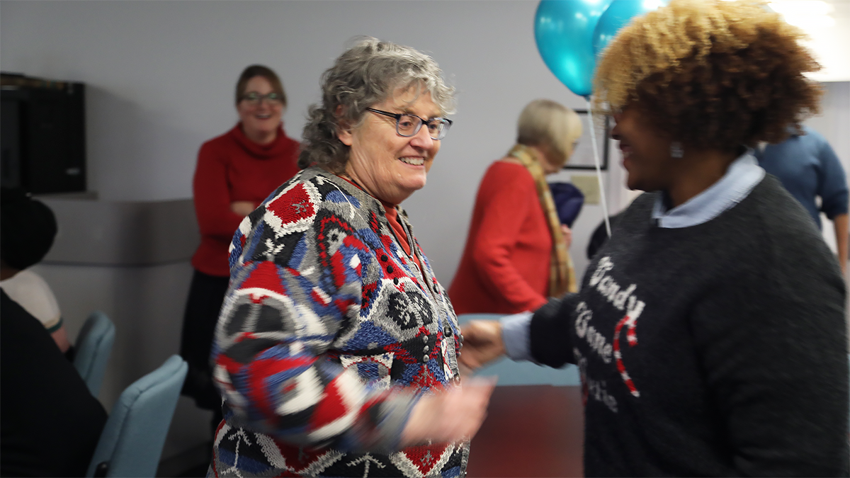 Karen and Yolanda hug
